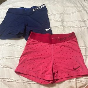 Women’s size medium Nike pro 2-pack, navy blue and hot pink